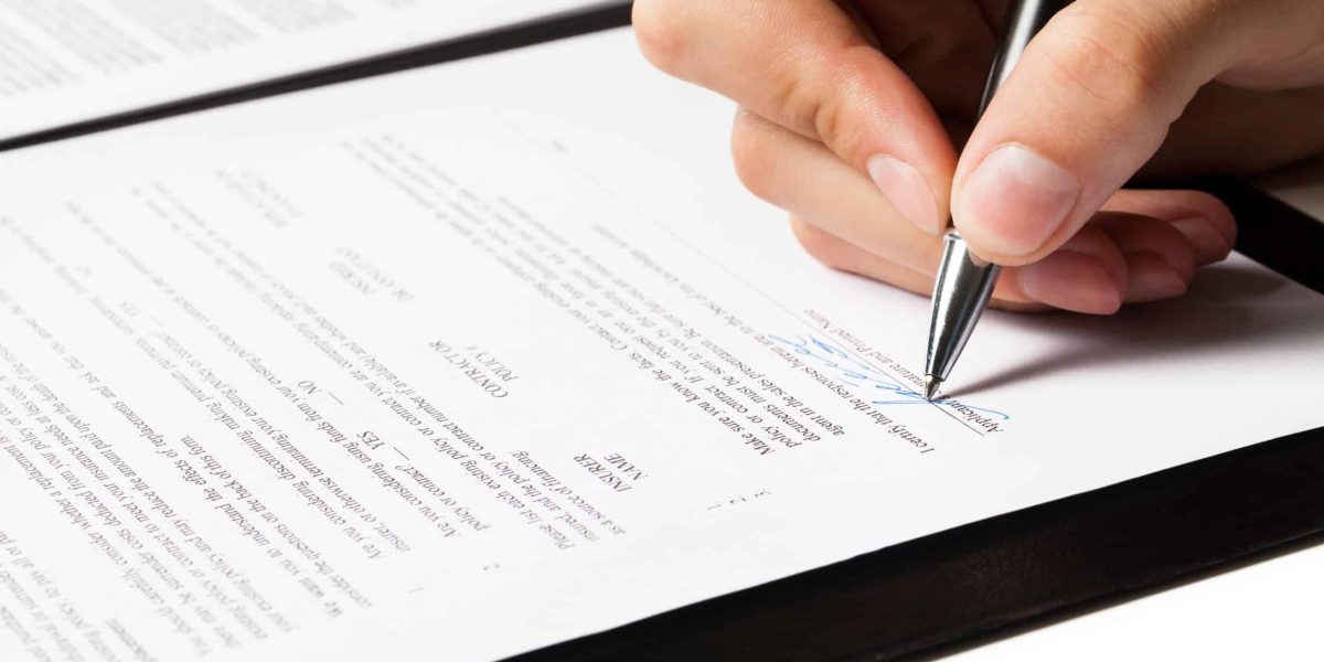 Business man hand holding pen